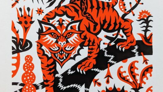 1. Tigre orange et noir stylisé, art mural vibrant et graphique.