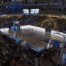 Lumière sur un match de basketball vibrant au Big City Nantes, avec public enthousiaste et ambiance énergique.