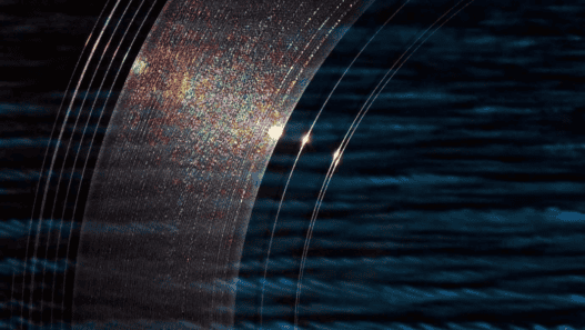 Image d'une installation sonore avec des ondes lumineuses et des effets visuels.